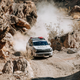 A line in the sand: Rounding a rock-studded curve in the 2023 Kia Sportage X-Pro. Shown with optional features. Not for sale.